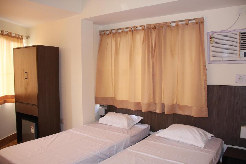 Down Town Guest House Calcutta Værelse billede