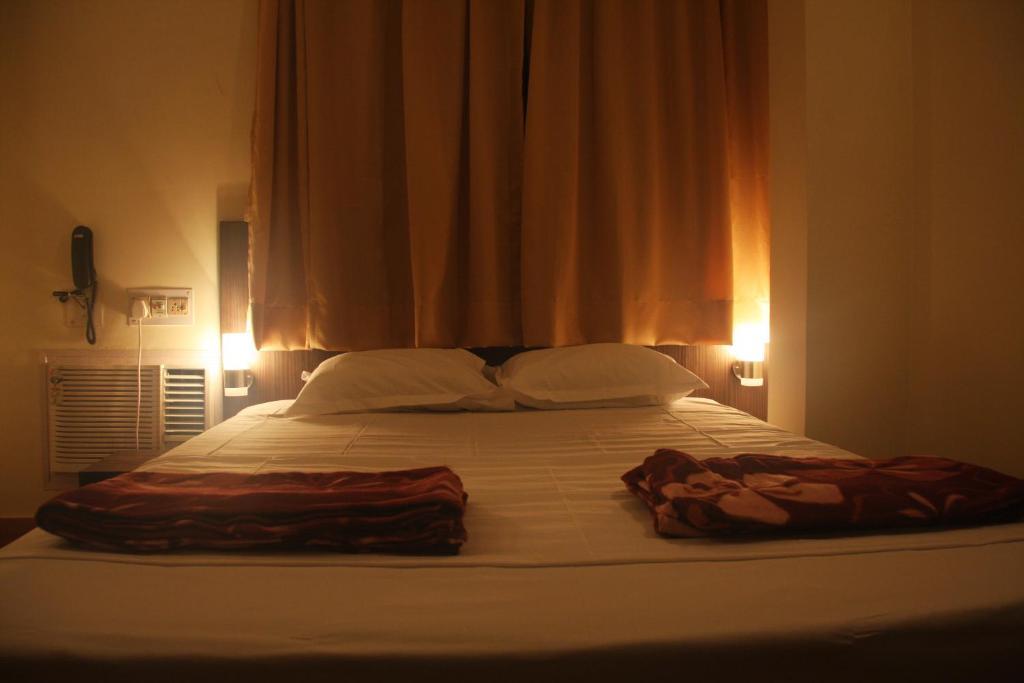 Down Town Guest House Calcutta Værelse billede